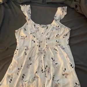 White romper with floral pattern that tied in the front from Arizona Jean Co.